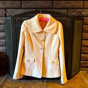 Selling a tulles women’s jacket. The color is a light beige, and size large!